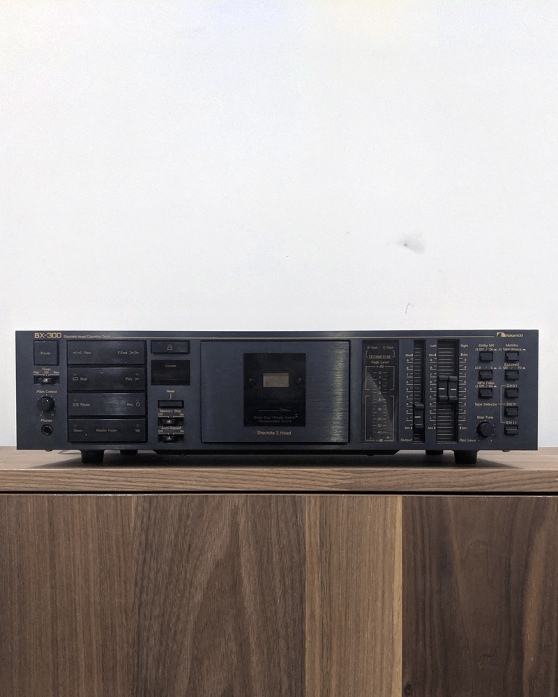 Audio system on wood table.