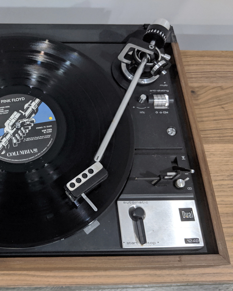 Dual record player with Pink Floyd vinyl.